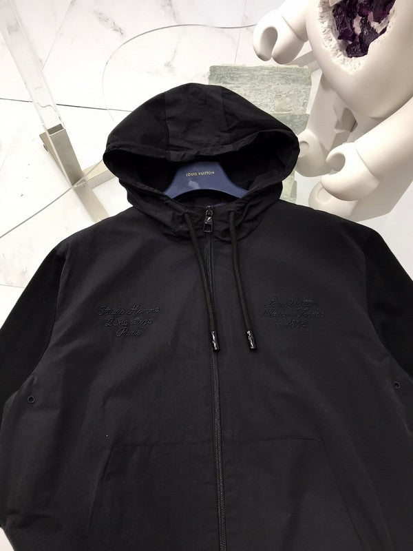 Back view of Louis Vuitton luxury clothing with signature branding