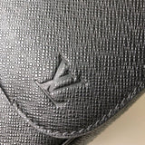Side profile of elevated statement women's handbag – women's luxury accessory