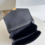 Styled lifestyle shot of modern elevated women's handbag – women's luxury accessory