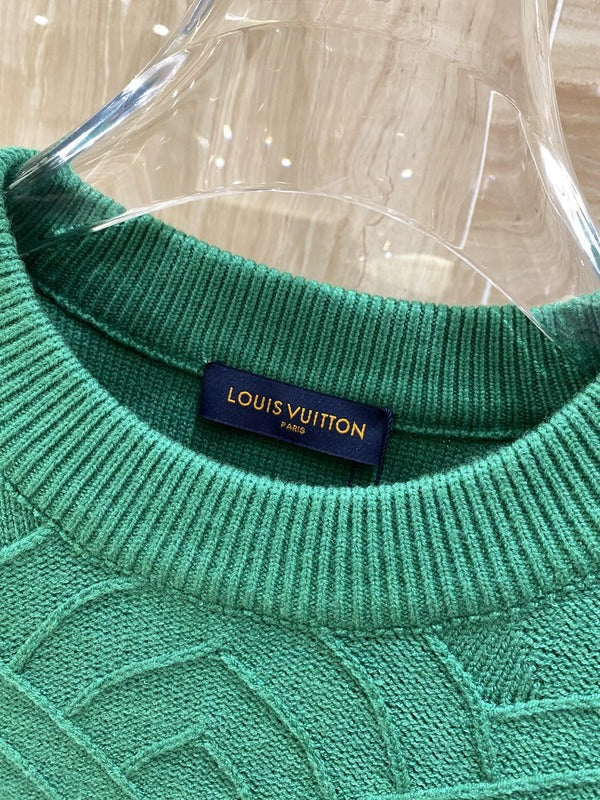 Flat lay presentation of Louis Vuitton luxury clothing with contemporary cut