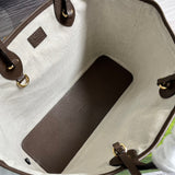 Side profile of polished modern women's handbag – women's luxury accessory