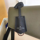 Handle and strap detail of elevated premium women's handbag – women's premium purse