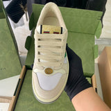 Gucci two-tone luxury sneakers view 9 signature lace-up style
