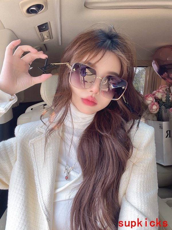 Lifestyle view of Louis Vuitton unisex sunglasses