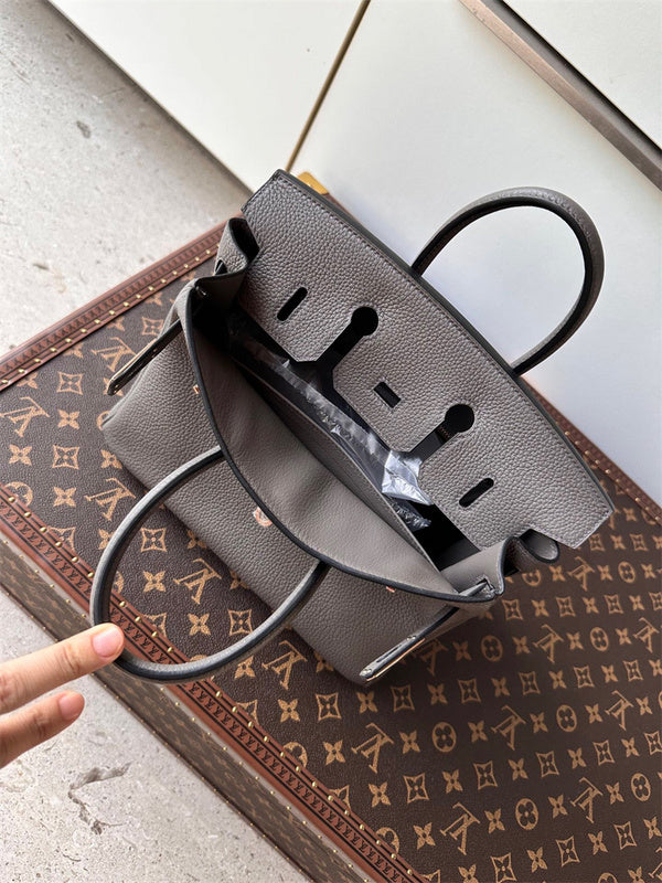  Classic top-handle bag carried on shoulder 10