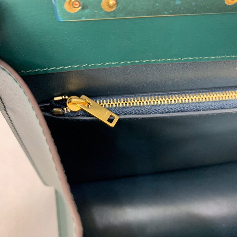 Handle and strap detail of modern refined women's handbag – women's premium purse