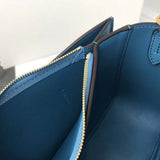 Side profile of chic structured women's handbag – women's designer-style accessory