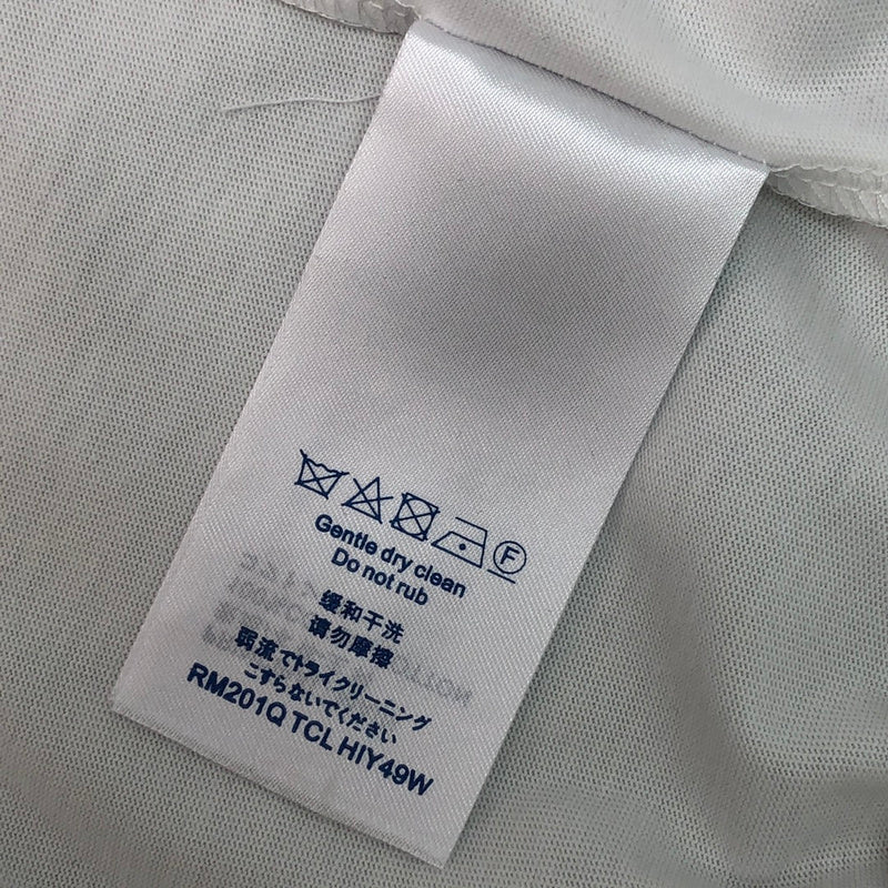 Flat lay presentation of Louis Vuitton cotton t-shirt with signature branding