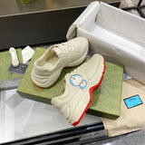 Gucci classic monochrome luxury sneakers view 9 retro runner design