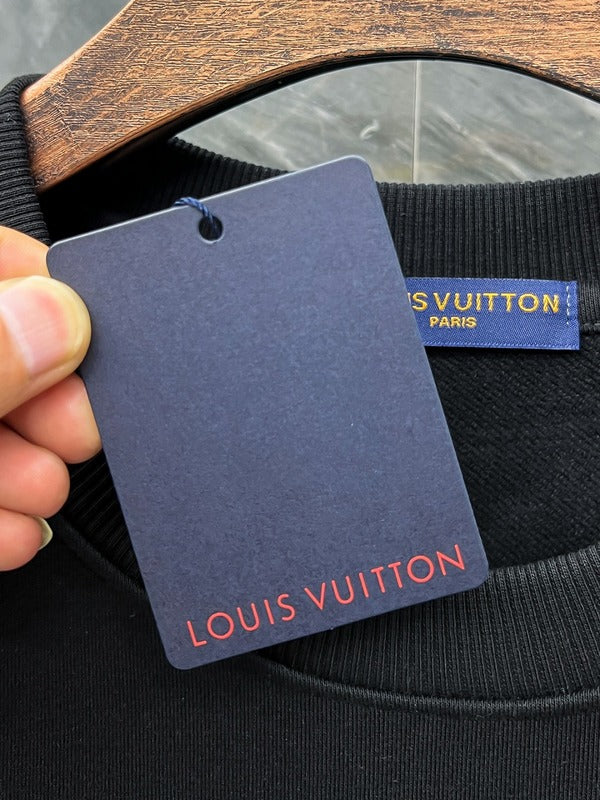 Close-up detail shot of Louis Vuitton luxury clothing with tailored silhouette