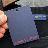 Close-up detail shot of Louis Vuitton luxury clothing with tailored silhouette