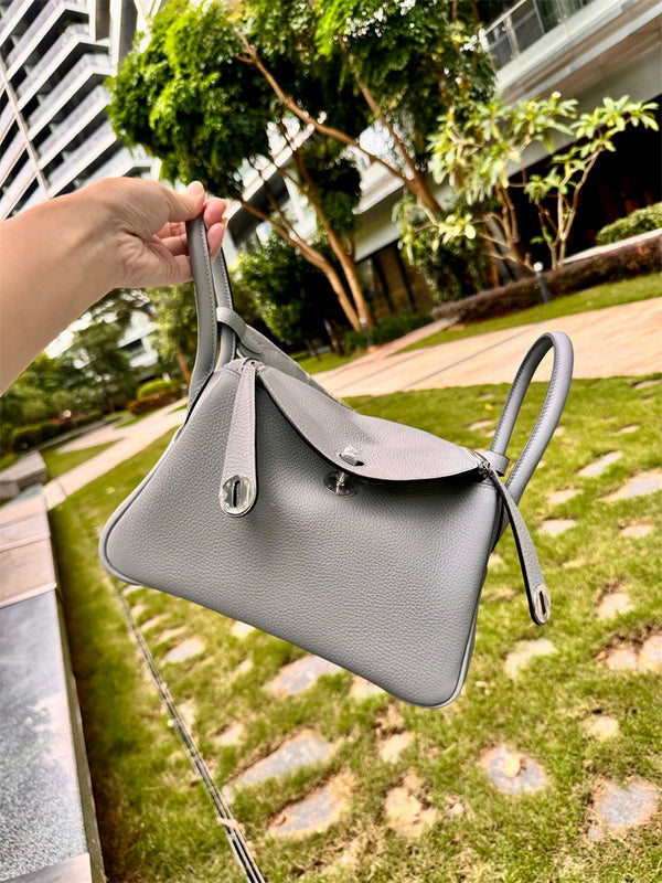 Side view of minimalist structured handbag