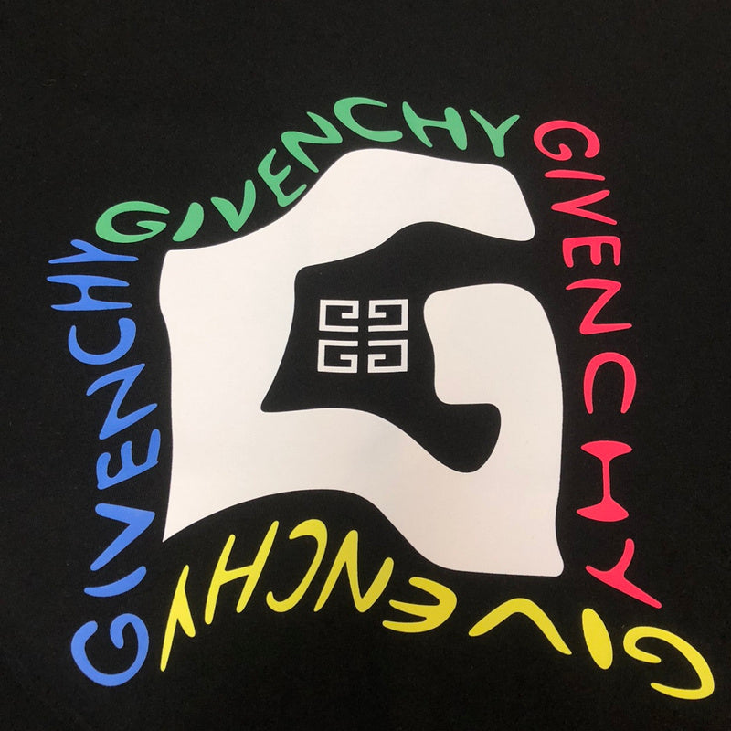 Flat lay presentation of Givenchy luxury clothing with tailored silhouette