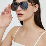 Side view of Louis Vuitton unisex sunglasses