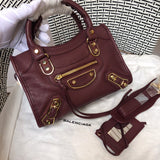 Side profile of everyday-luxe sleek women's handbag – women's statement bag