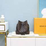 Side profile of classic refined women's handbag – women's statement bag