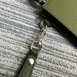 Handle and strap detail of structured everyday-luxe women's handbag – women's statement bag