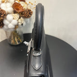 Close-up detail of sculpted bag design