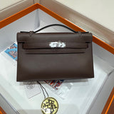 Side view of understated structured handbag