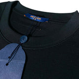 Close-up detail shot of Louis Vuitton cotton t-shirt with contemporary cut