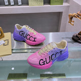 Side profile of Gucci fresh white-and-black sneakers signature lace-up style