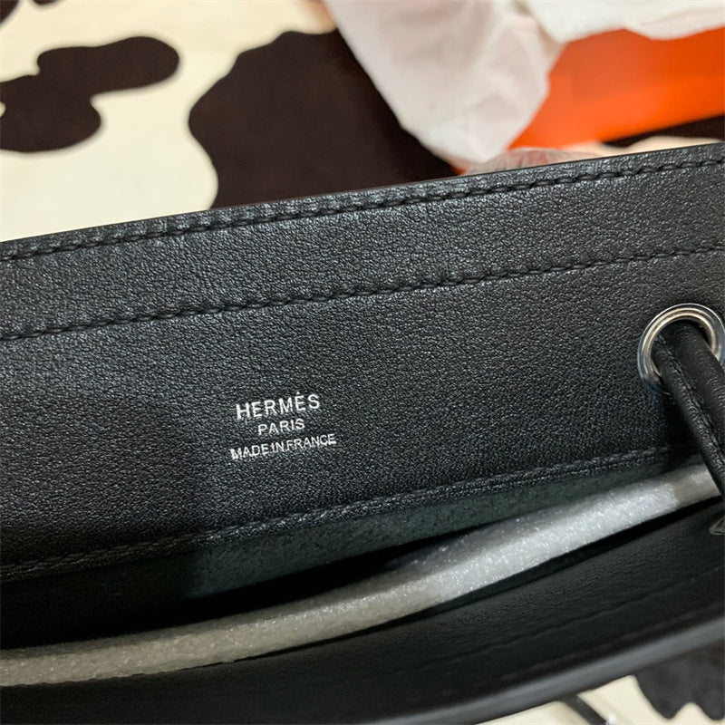Side view of classic structured handbag