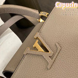 Back view of classic polished women's handbag – women's everyday handbag