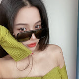 Lifestyle view of Louis Vuitton unisex sunglasses