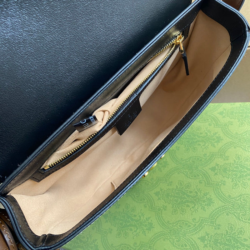Front view of statement signature women's handbag – women's luxury handbag