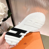 Hermès White High-Top Sneakers - Side Profile View