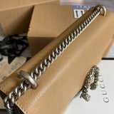 Styled lifestyle shot of modern everyday-luxe women's handbag – women's luxury accessory