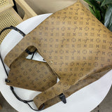  Essential top-handle bag carried on shoulder