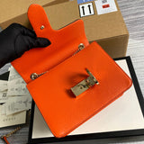 Close-up detail of structured polished women's handbag – women's luxury accessory