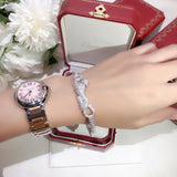 Side view of Cartier unisex jewelry piece
