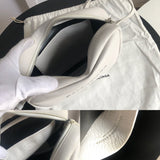 Side profile of everyday-luxe signature women's handbag – women's designer-style accessory