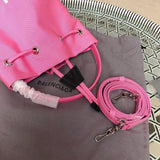 Back view of statement elevated women's handbag – women's luxury accessory