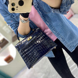 Side view of graceful structured handbag