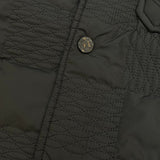 Flat lay presentation of Louis Vuitton luxury clothing with everyday silhouette