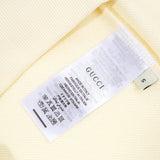 Close-up detail shot of Gucci luxury clothing with contemporary cut