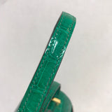 Side view of poised structured handbag