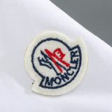 Back view of Moncler luxury clothing with tailored silhouette