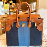  clean-lined satchel detail view showing craftsmanship