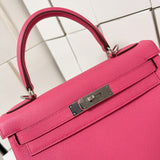 Side view of sculpted structured handbag