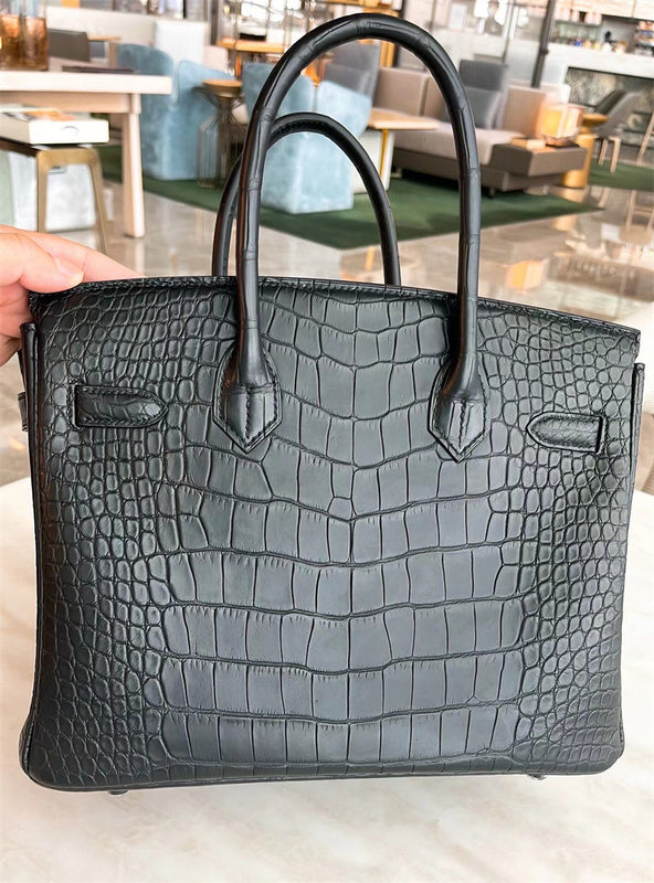  Graceful structured bag carried on shoulder 10