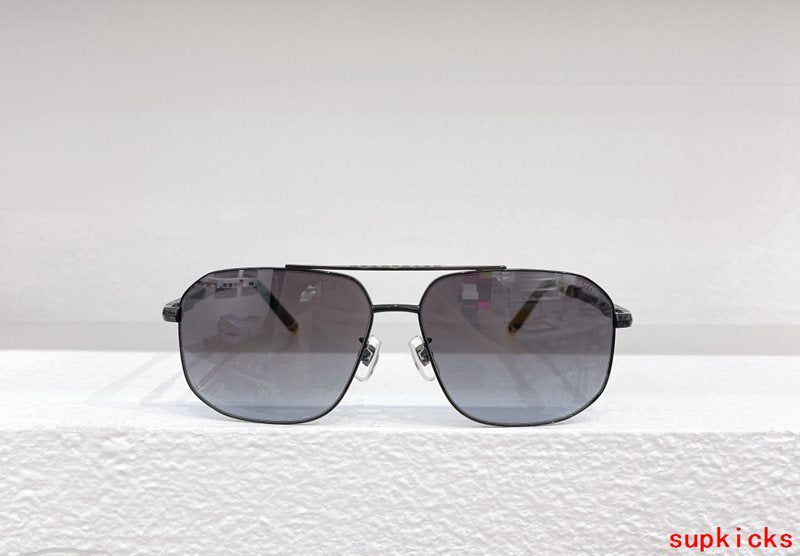 Close-up detail view of Louis Vuitton unisex sunglasses
