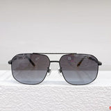 Close-up detail view of Louis Vuitton unisex sunglasses