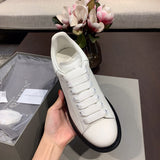 Alexander McQueen classic monochrome luxury sneakers view 5 everyday casual design