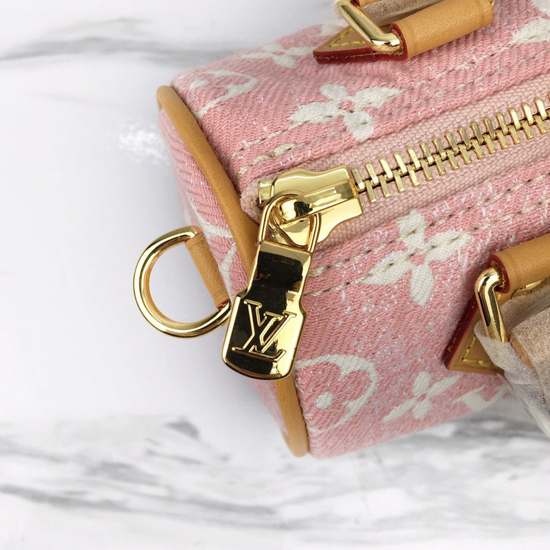Back view of modern signature women's handbag – women's statement bag