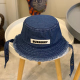 Close-up detail view of Burberry unisex cap