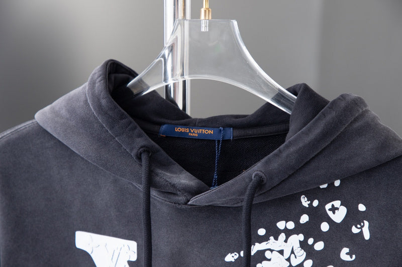 Close-up detail shot of Louis Vuitton luxury clothing with tailored silhouette